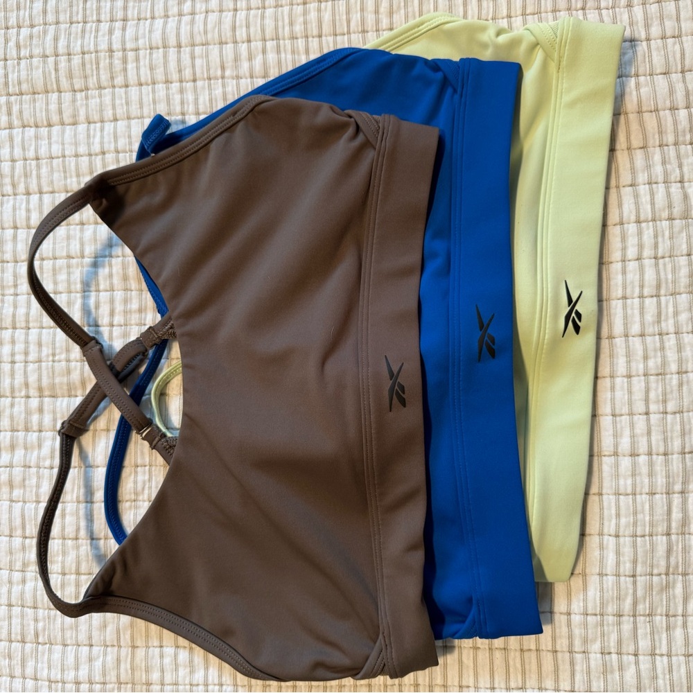 Reebok Sports Bras in Brown, Blue, and Yellow